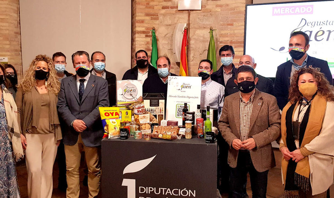 Entrega de 582 botellas de AOVE con IGP «Aceite de Jaén» a los compradores del Mercado Navideño «Degusta Jaén»